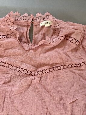 Women’s pink blouse with lace